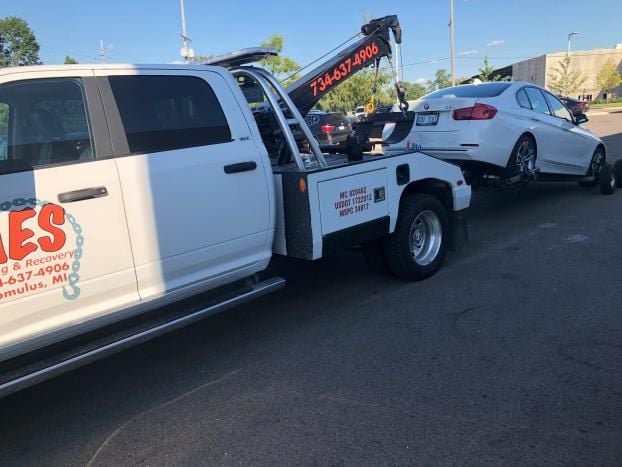 An employee at AES Towing & Recovery